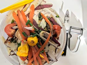 A vibrant pile of vegetable peels for composting, promoting sustainable living.