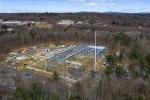 Aerial drone photograph of new materials recycling building construction 4/1/2026