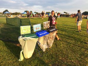 Paired trash and recycling containers at an outdoor event in Chittenden county.